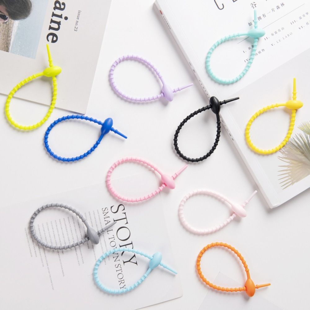 Tadpole型ケーブルワインダー、シリコンリボン、イヤホン - Cable Winder Keychain のレビューと価格