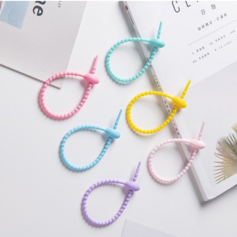 Tadpole型ケーブルワインダー、シリコンリボン、イヤホン - Cable Winder Keychain のレビューと価格